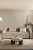 rozkladana-sofa-3-osobowa-z-tkaniny-boucle-dalila.jpg